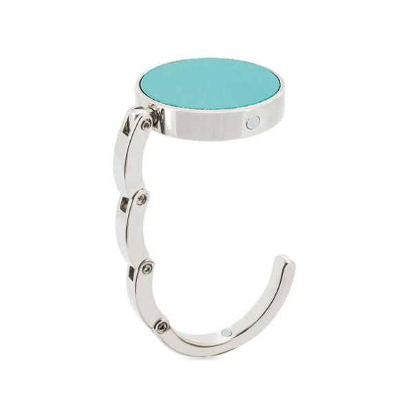 Cuelga Bolsos Portátil y Plegable – Seguridad y Estilo para tu Bolso en Cualquier Lugar