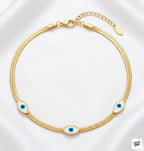 Pulsera de Acero Dorado con Detalles de Ojo: Elegancia y Diseño Atemporal