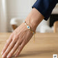 Pulsera de Acero Dorado con Detalles de Ojo: Elegancia y Diseño Atemporal